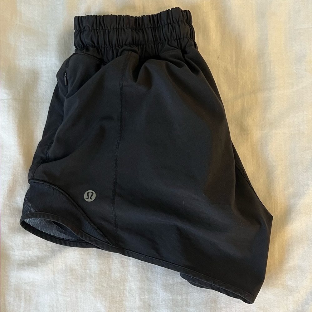 Lululemon Hottie Hots in Black      size: 2    length: 4”.   low rise